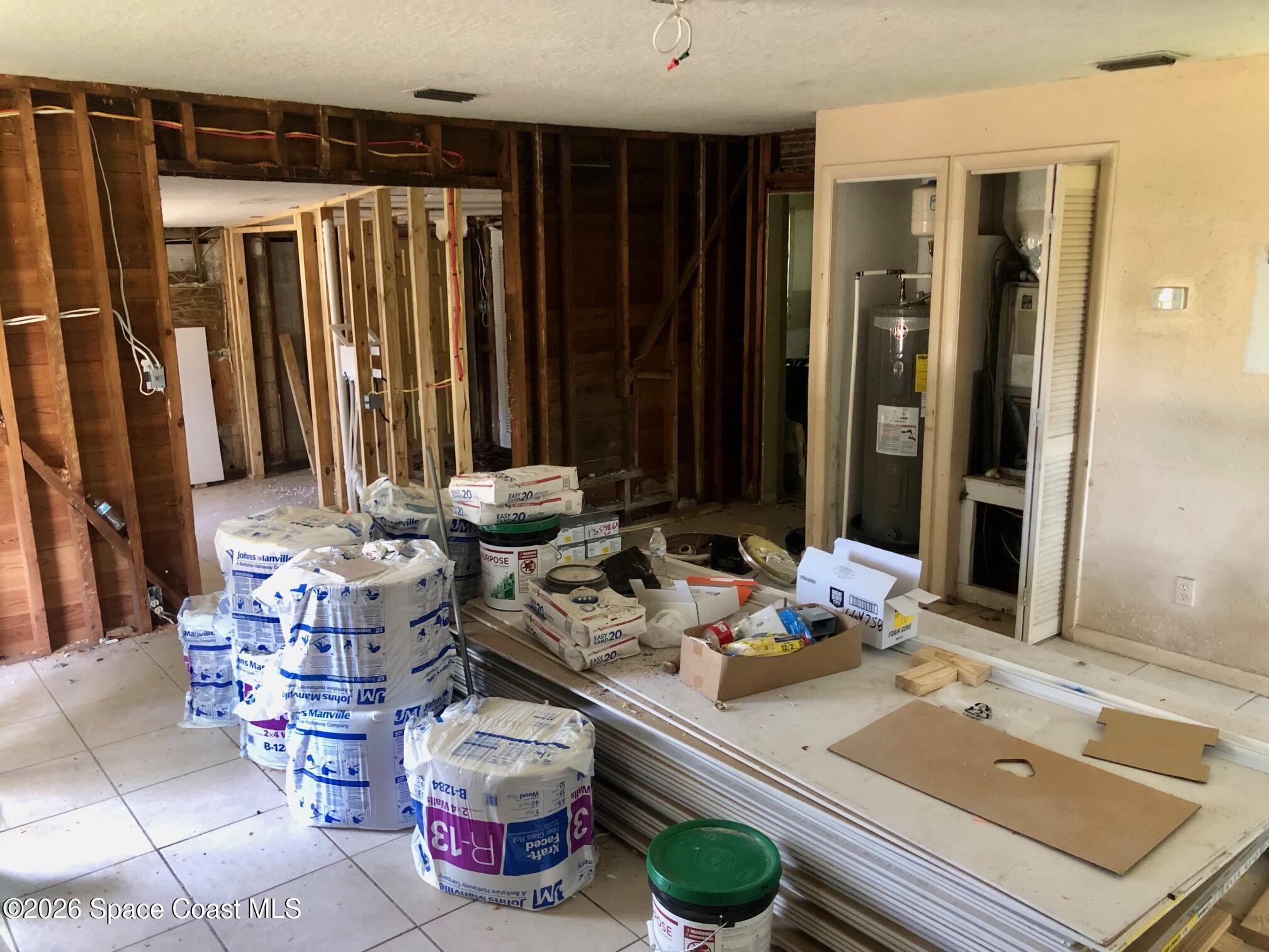 1236 Jackson Street Cocoa, FL 32922 - Photo 4 of 14 a room with furniture and a large window