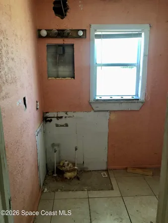 a bathroom with a window