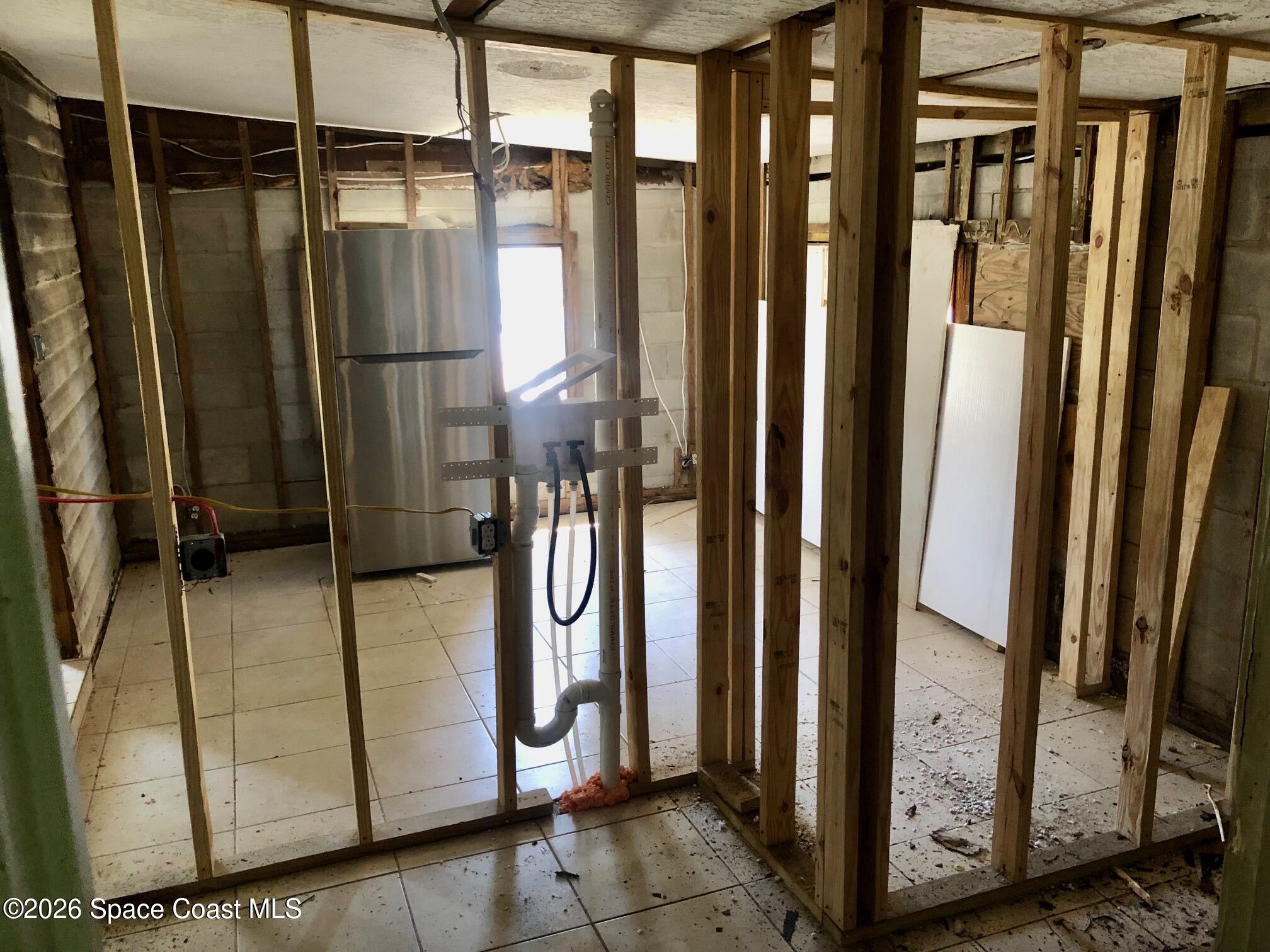 1236 Jackson Street Cocoa, FL 32922 - Photo 10 of 14 a view of a bathroom with a glass door