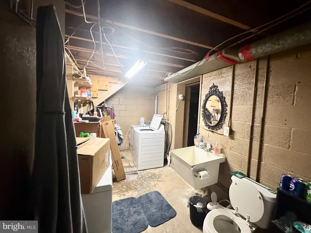 a kitchen with refrigerator and window