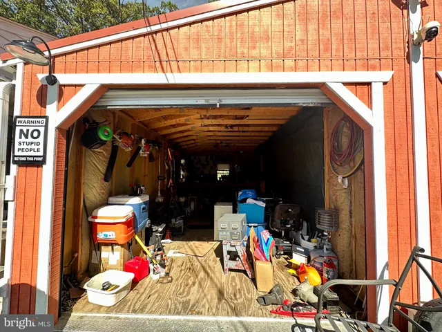 a backyard of a house with yard and outdoor seating