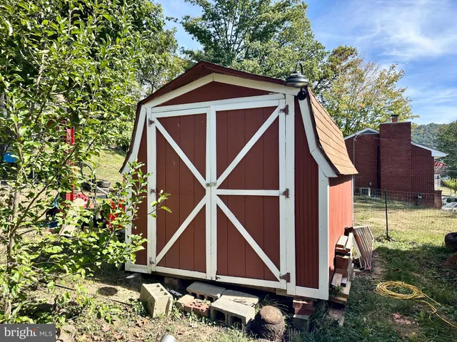 a view of swimming pool with a patio