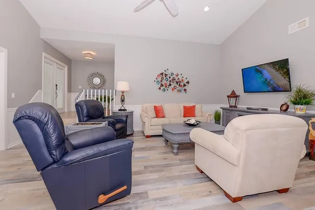 a living room with furniture and a couch