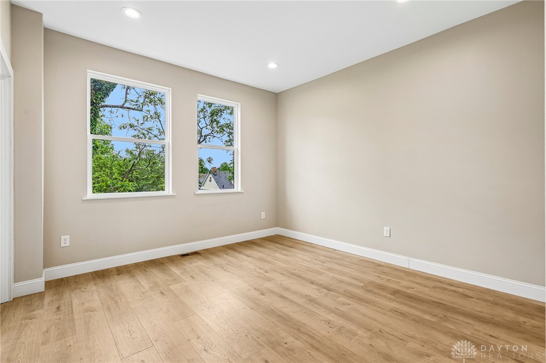 3906 Edwards Road, Unit C Cincinnati, OH 45209 - Photo 33 of 46 This spacious room features ample natural light and durable flooring, perfect for versatile living.