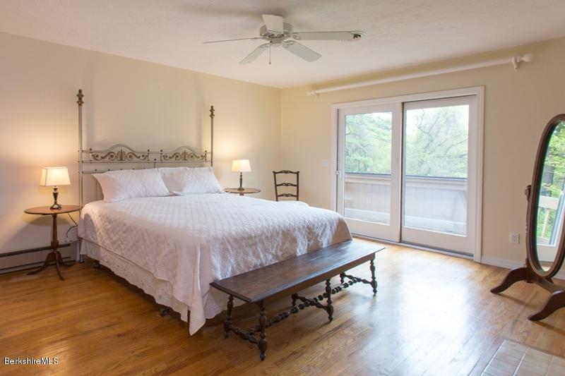 755 Tyringham Road Lee, MA 01238 - Photo 17 of 32 a bed room with a bed and a window