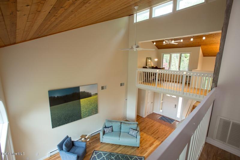 755 Tyringham Road Lee, MA 01238 - Photo 19 of 32 a view of entryway with wooden floor