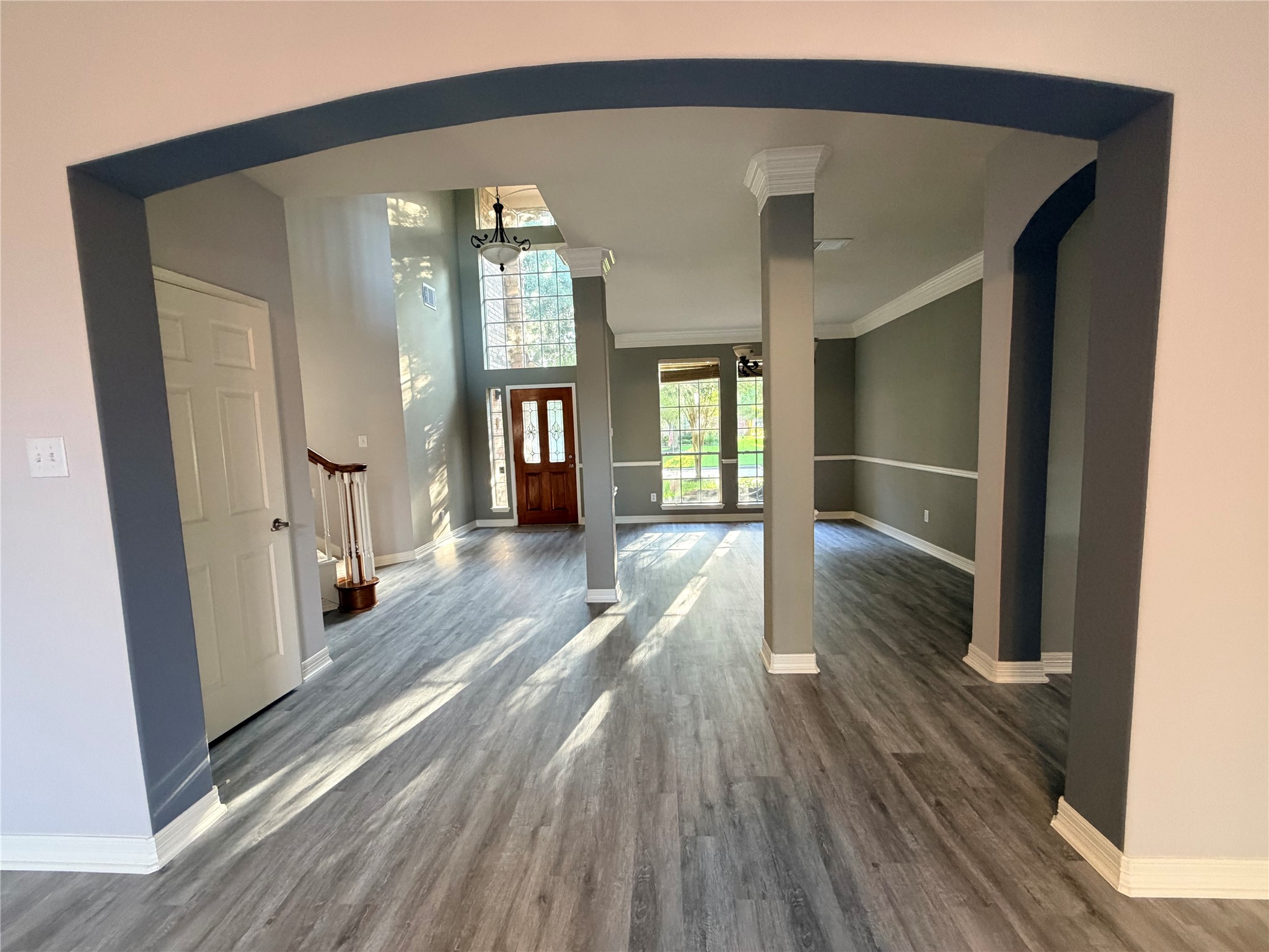 2303 Chelsea Ridge Court Katy, TX 77450 - Photo 10 of 12 a view of a hallway view with wooden floor and staircase