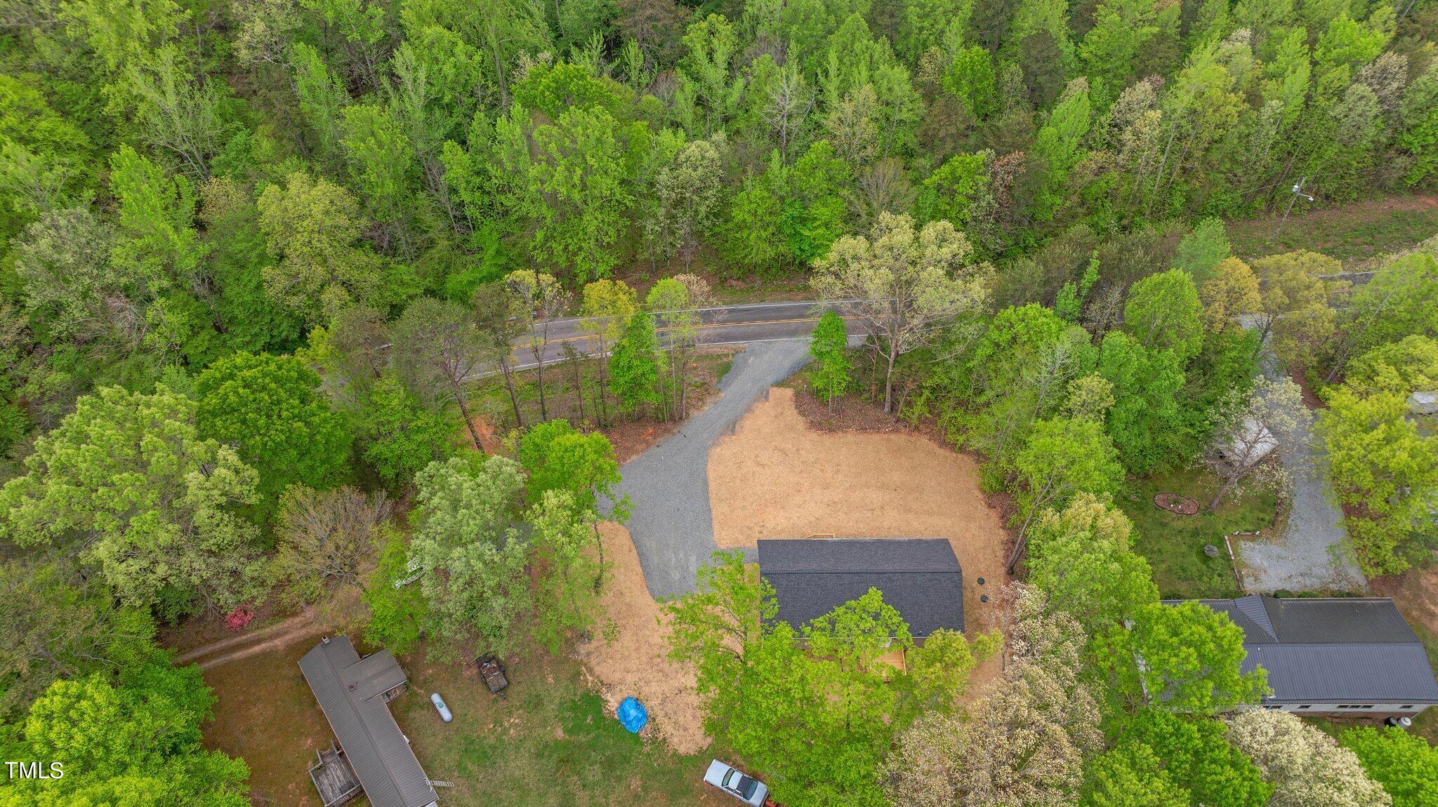 474 Street's Store Road Roxboro, NC 27574 - Photo 46 of 49 an aerial view of a house with a yard basket ball court and outdoor seating