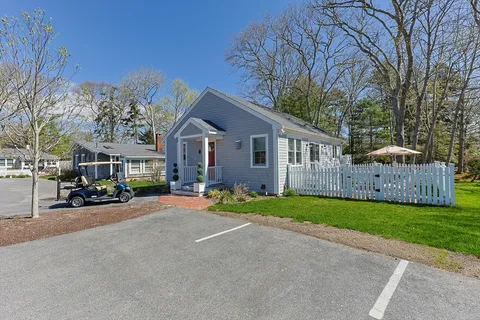 a house view with a garden space