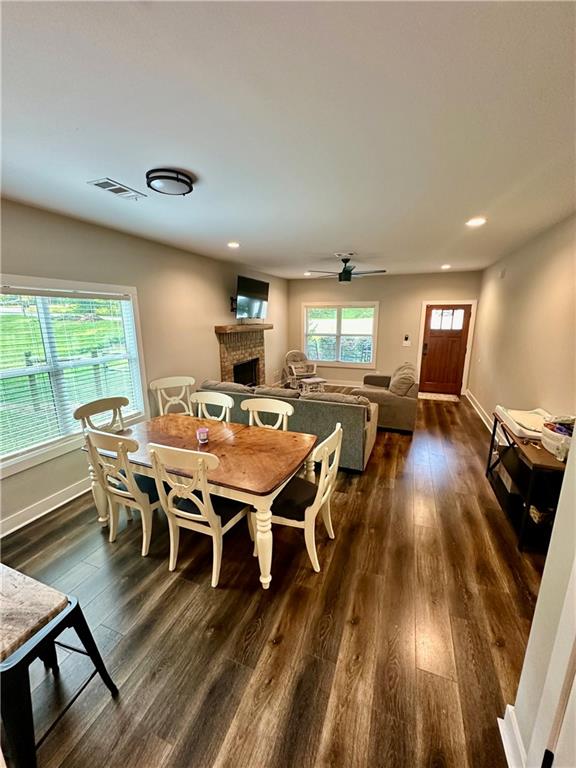 815 Poplar Street Monticello, GA 31064 - Photo 9 of 33 a view of a dining room with furniture window and wooden floor