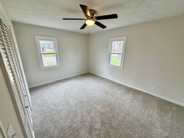 109 South Elm Street Lexington, IL 61753 - Photo 11 of 20 a view of an empty room with a window