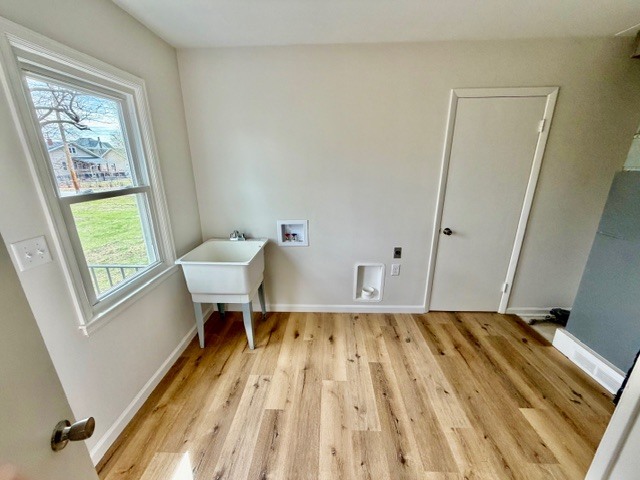 109 South Elm Street Lexington, IL 61753 - Photo 13 of 20 a bedroom with a bed and a window