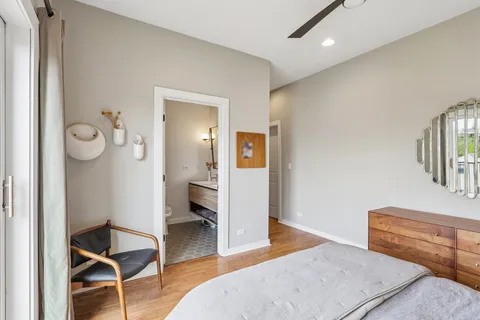 a bedroom with furniture and a window