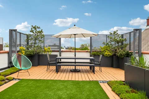 a view of a swimming pool with a lounge chairs