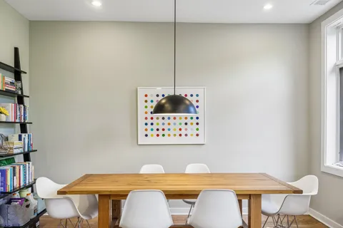 a view of a dining room with furniture
