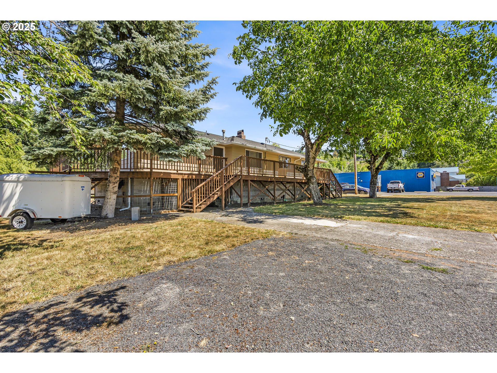 821 Bridge Street Vernonia, OR 97064 - Photo 12 of 45 a view of a house with a yard