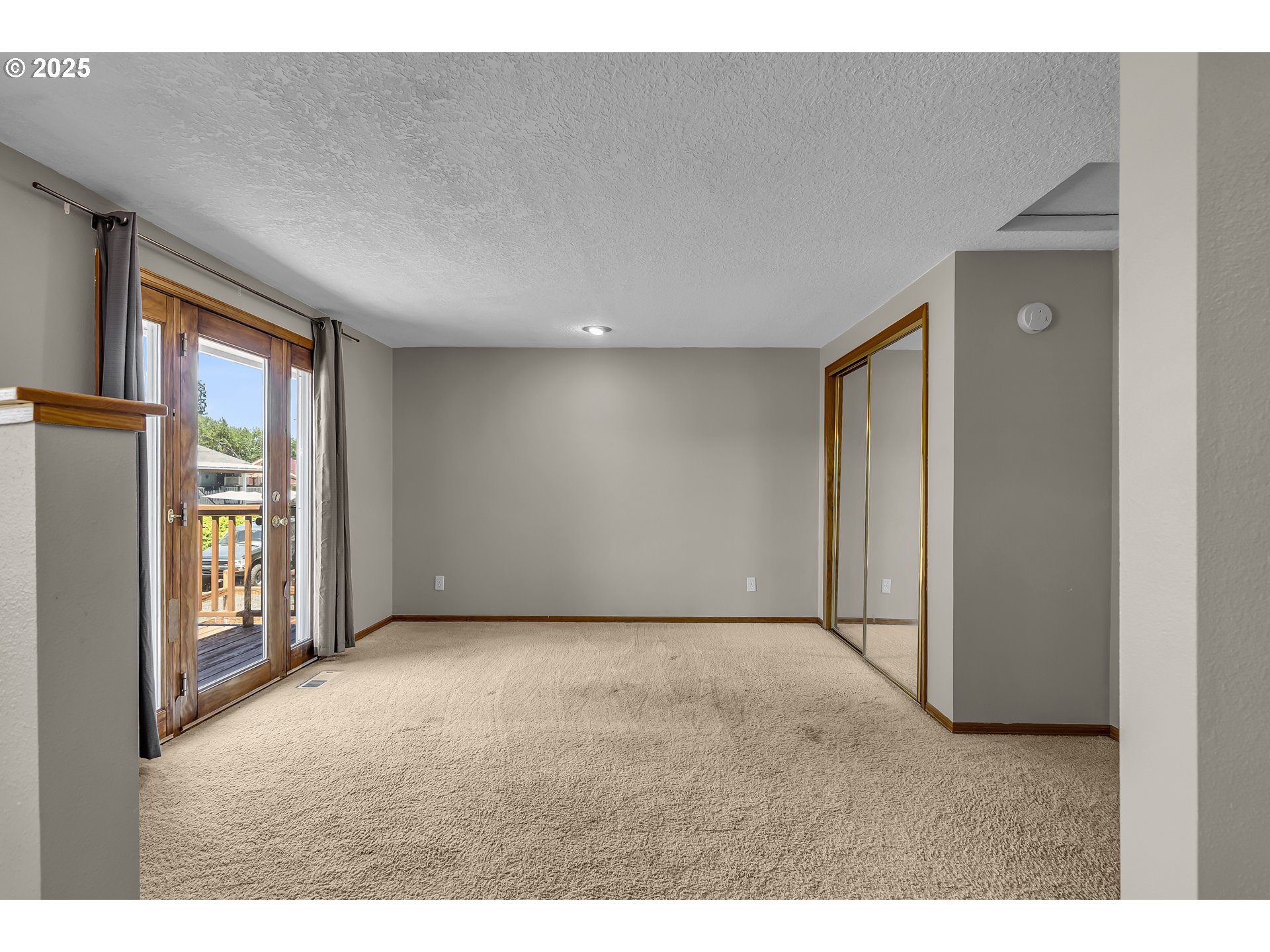 821 Bridge Street Vernonia, OR 97064 - Photo 28 of 45 a view of an empty room with glass door