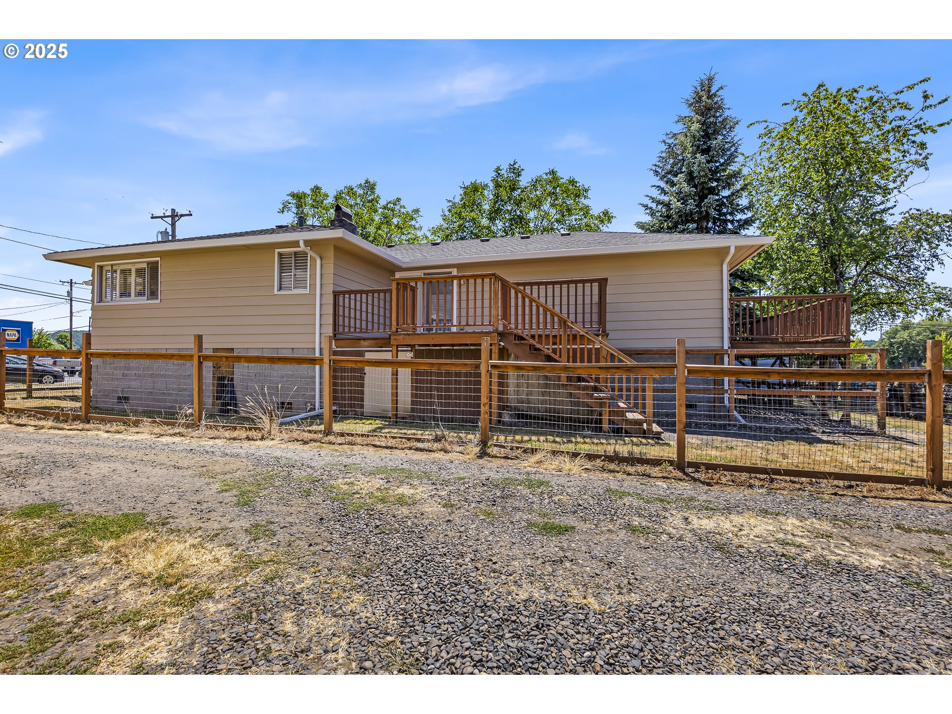 821 Bridge Street Vernonia, OR 97064 - Photo 43 of 45 a view of a house with wooden fence