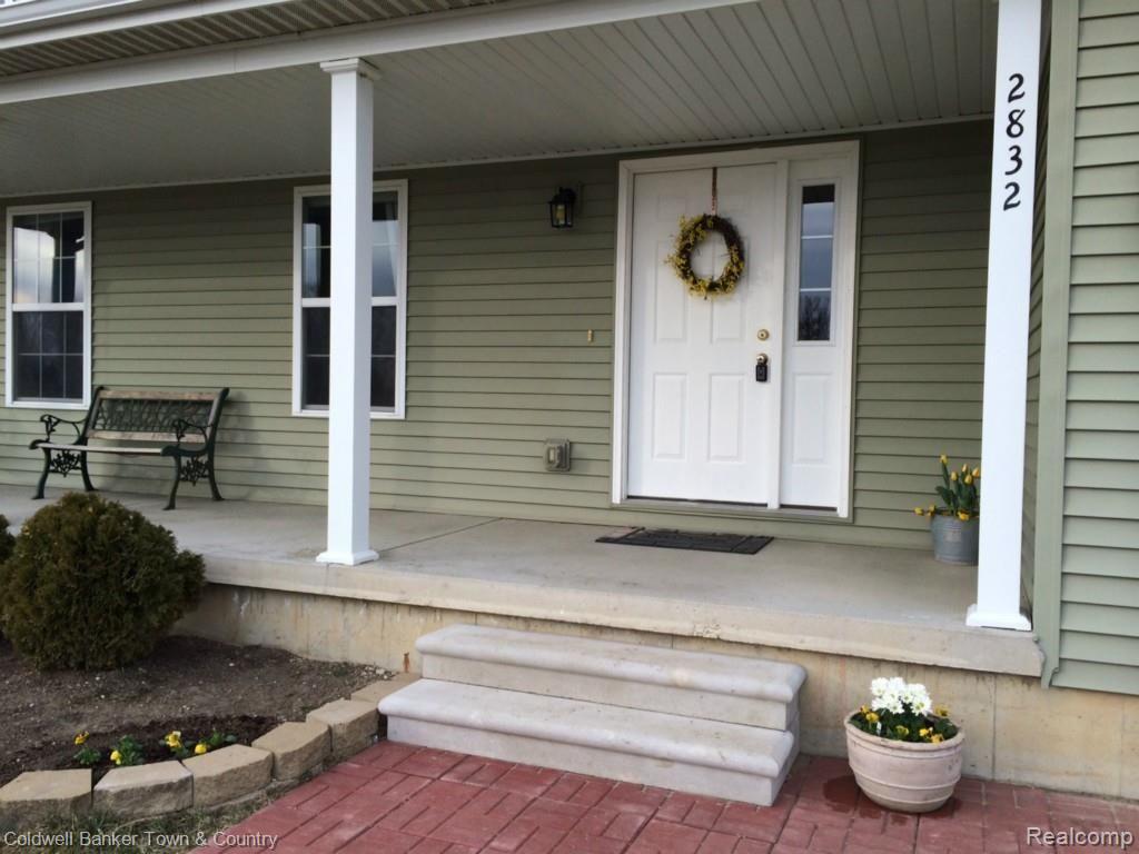 2832 Fisher Road Howell, MI 48855 - Photo 2 of 37 Paver Walkway leads to front porch