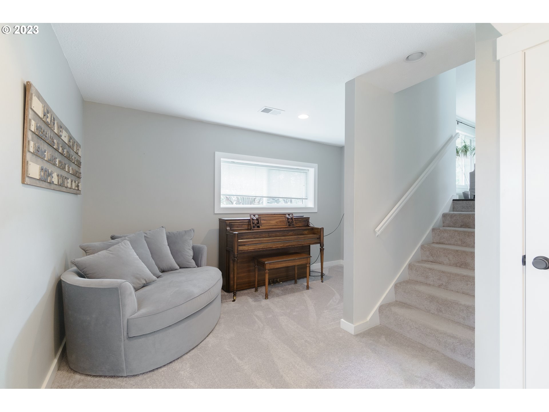35243 McKenzie View Drive Springfield, OR 97478 - Photo 13 of 23 a living room with furniture and a wooden floor
