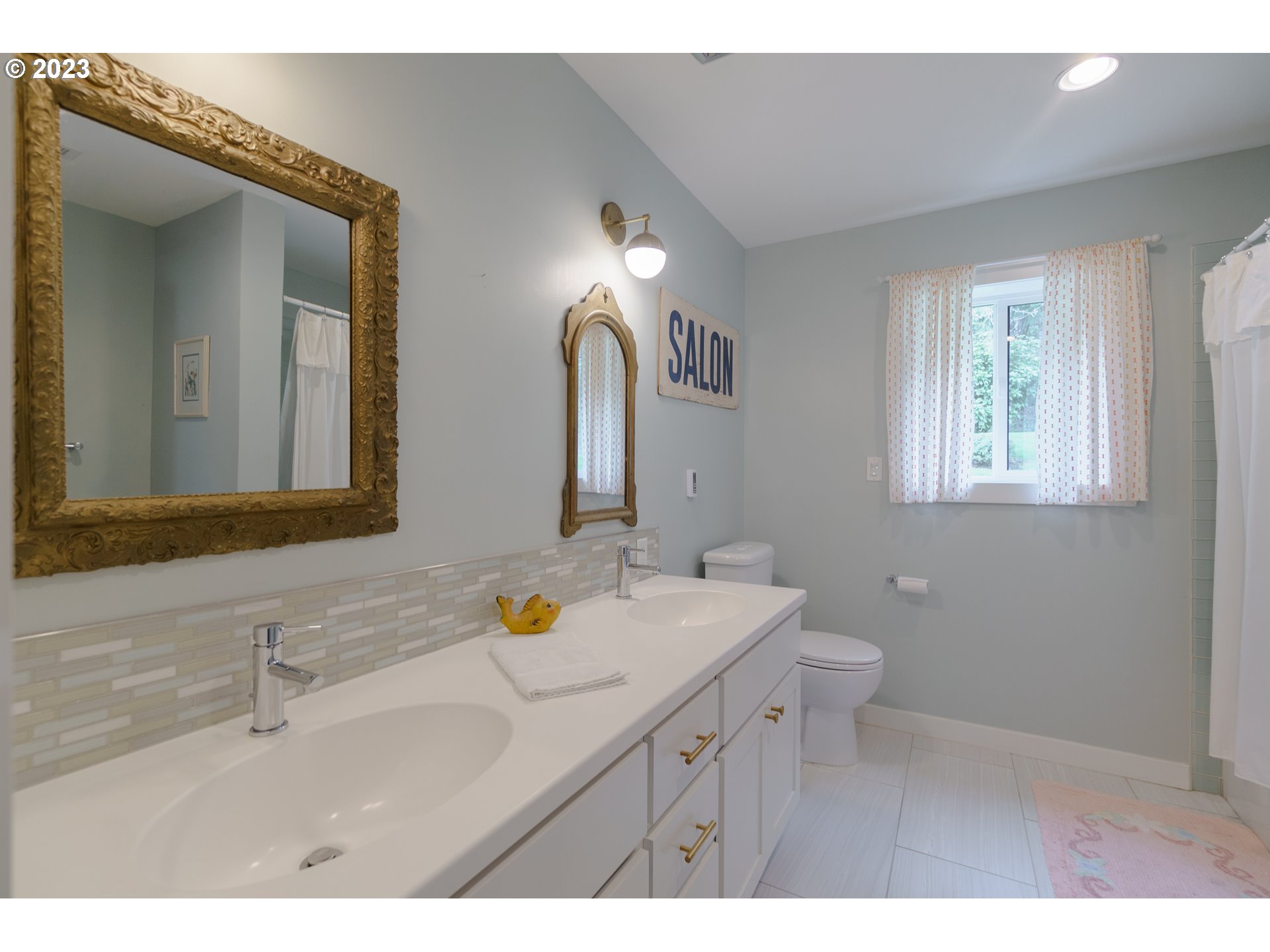 35243 McKenzie View Drive Springfield, OR 97478 - Photo 15 of 23 a bathroom with a sink and a mirror