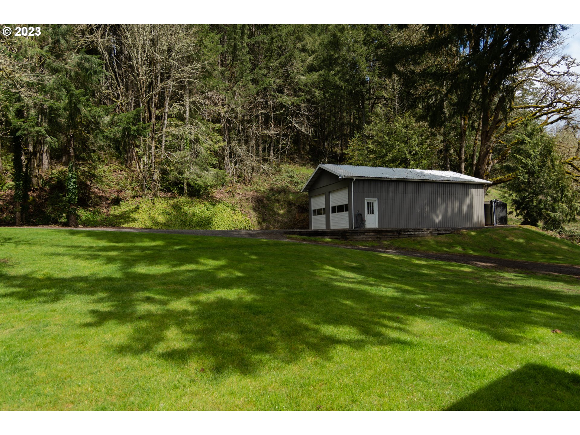 35243 McKenzie View Drive Springfield, OR 97478 - Photo 19 of 23 a house view with a garden