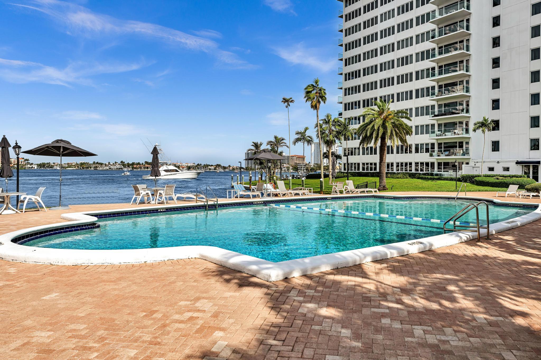 701 East Camino Real, Unit 12G Boca Raton, FL 33432 - Photo 41 of 82 a view of swimming pool with outdoor space