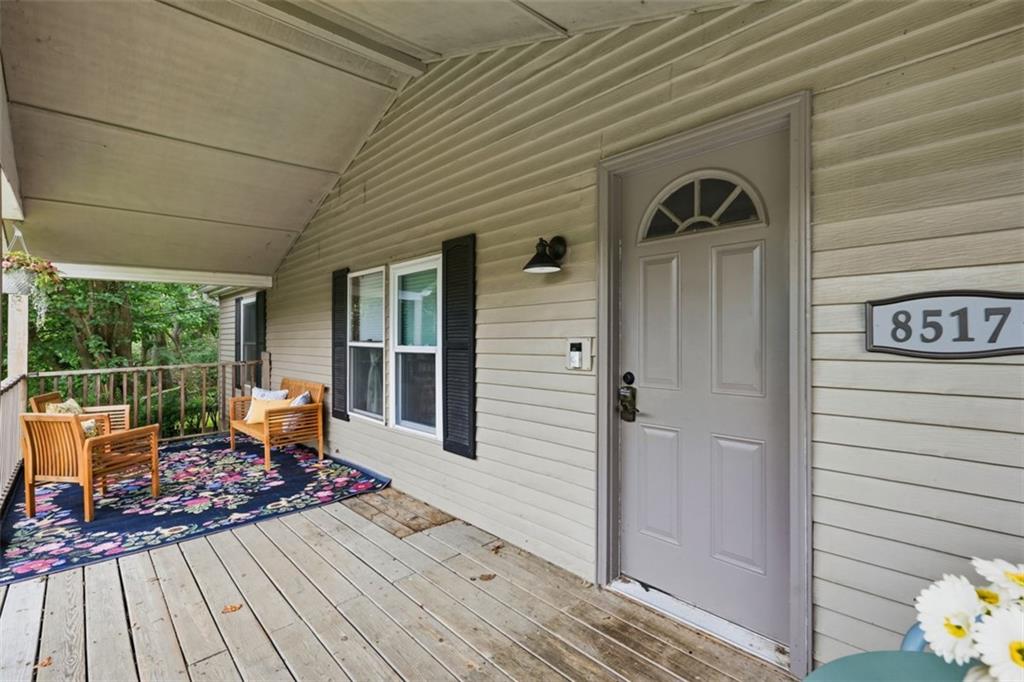 8517 Wittmer Road Pittsburgh, PA 15237 - Photo 37 of 46 a balcony with wooden floor and furniture