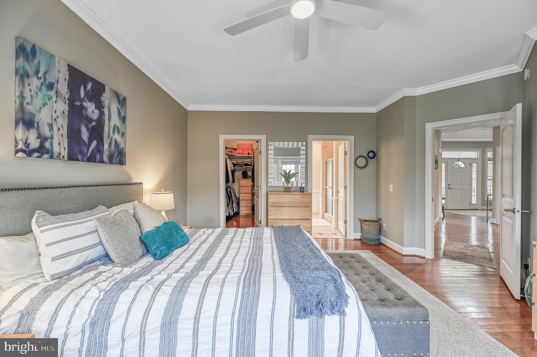 14 Elnor Road Bumpass, VA 23024 - Photo 22 of 69 a bedroom with a large bed and a chandelier