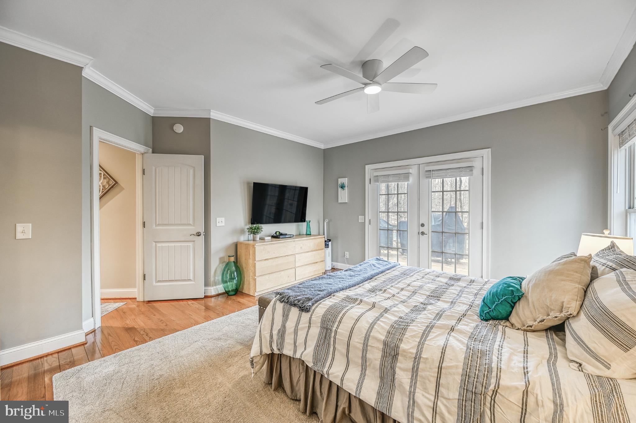 14 Elnor Road Bumpass, VA 23024 - Photo 23 of 69 a bedroom with a bed and a flat screen tv