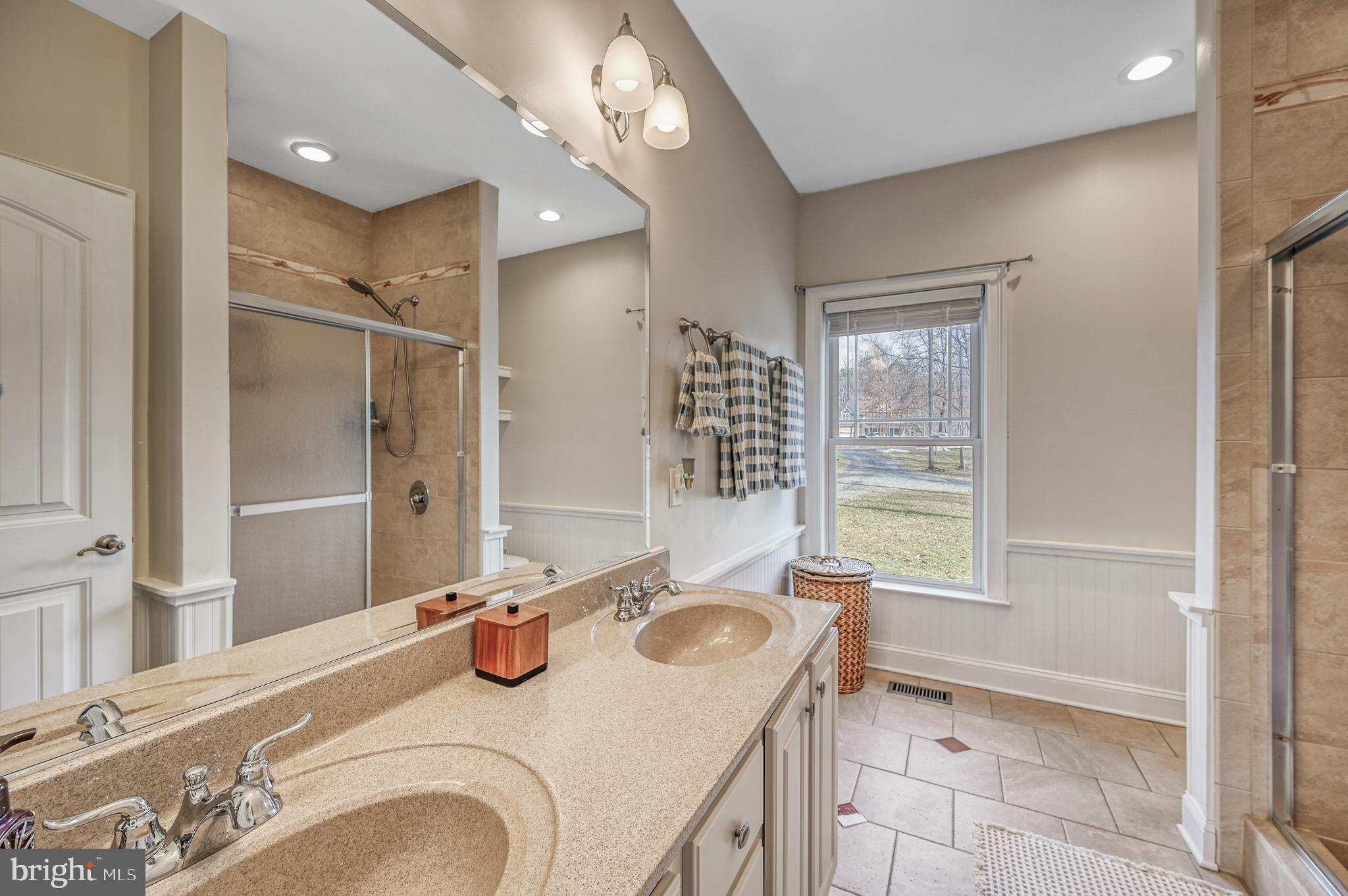14 Elnor Road Bumpass, VA 23024 - Photo 24 of 69 Elegant bathroom with natural light.