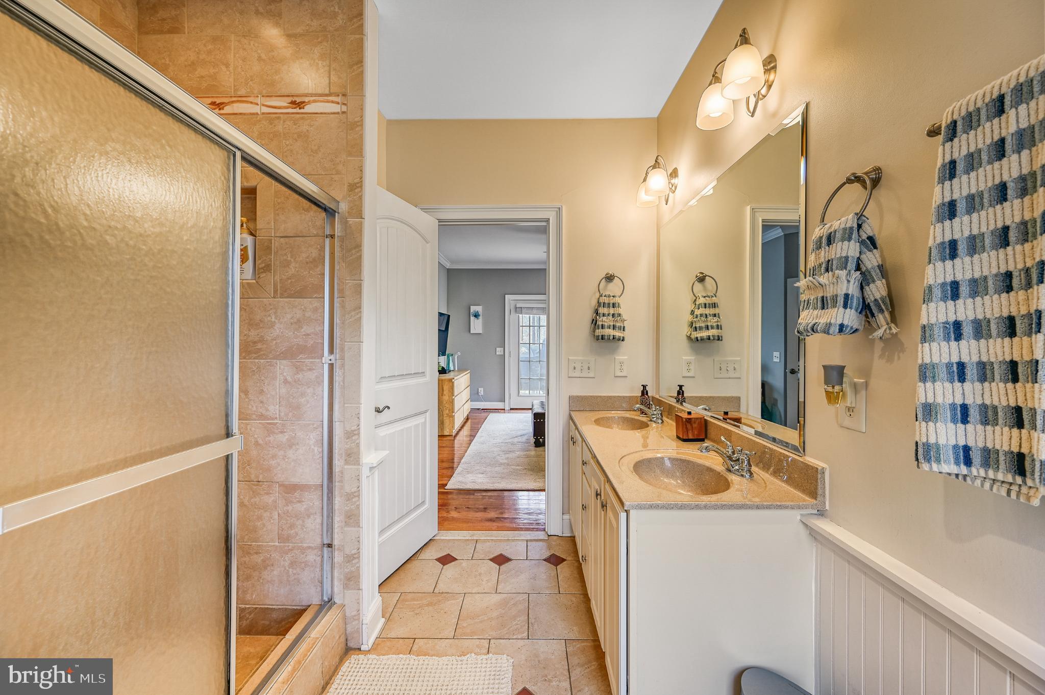 14 Elnor Road Bumpass, VA 23024 - Photo 25 of 69 a bathroom with a tub sink and mirror
