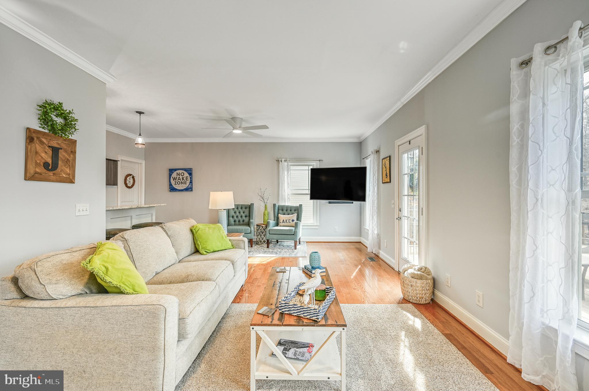 14 Elnor Road Bumpass, VA 23024 - Photo 31 of 69 a living room with furniture and a flat screen tv