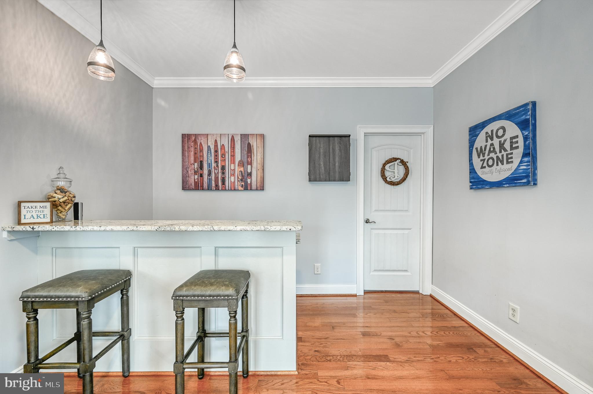 14 Elnor Road Bumpass, VA 23024 - Photo 34 of 69 Charming bar area with lake-inspired decor.