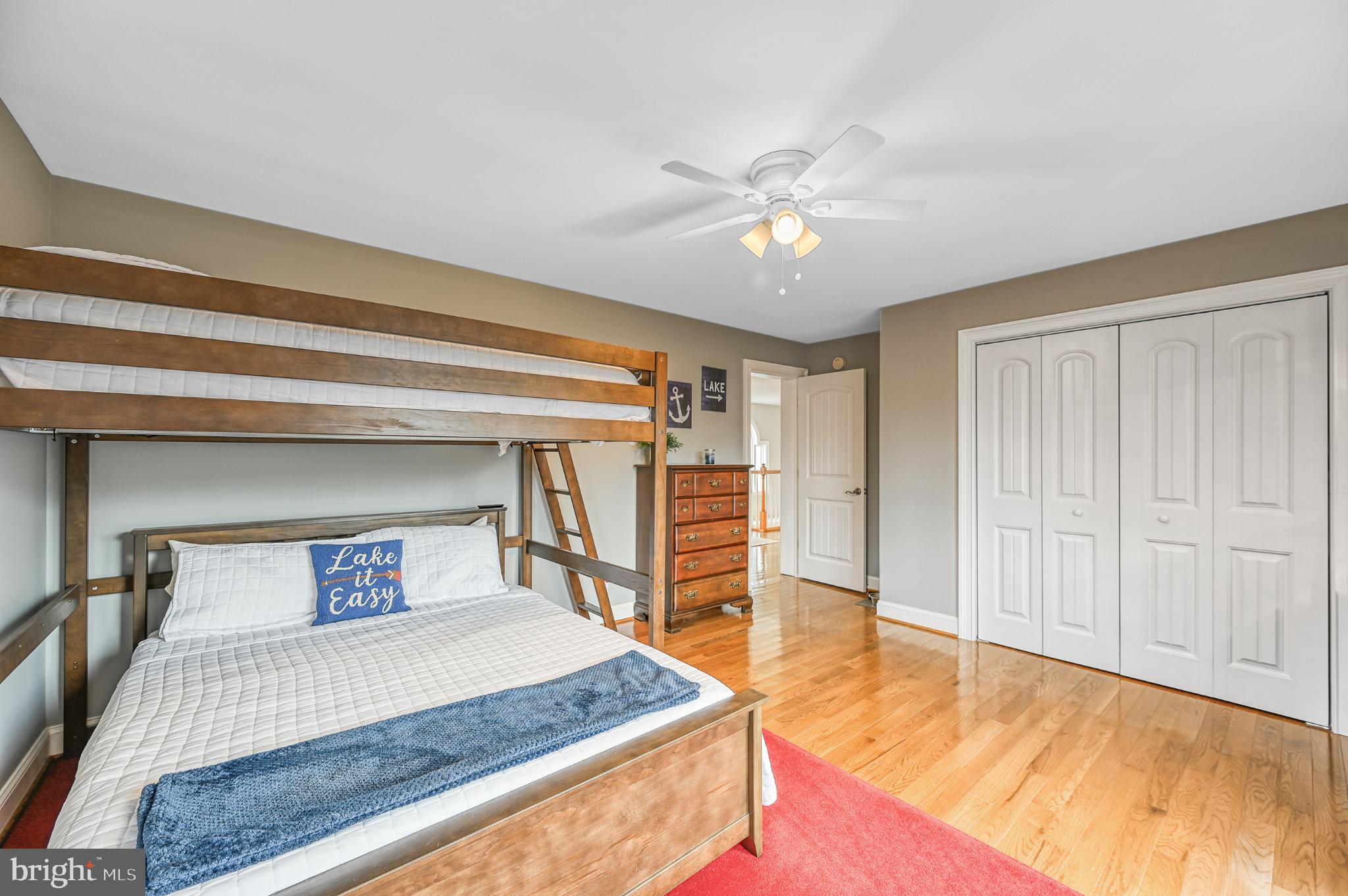 14 Elnor Road Bumpass, VA 23024 - Photo 41 of 69 a bedroom with a bed and a chandelier