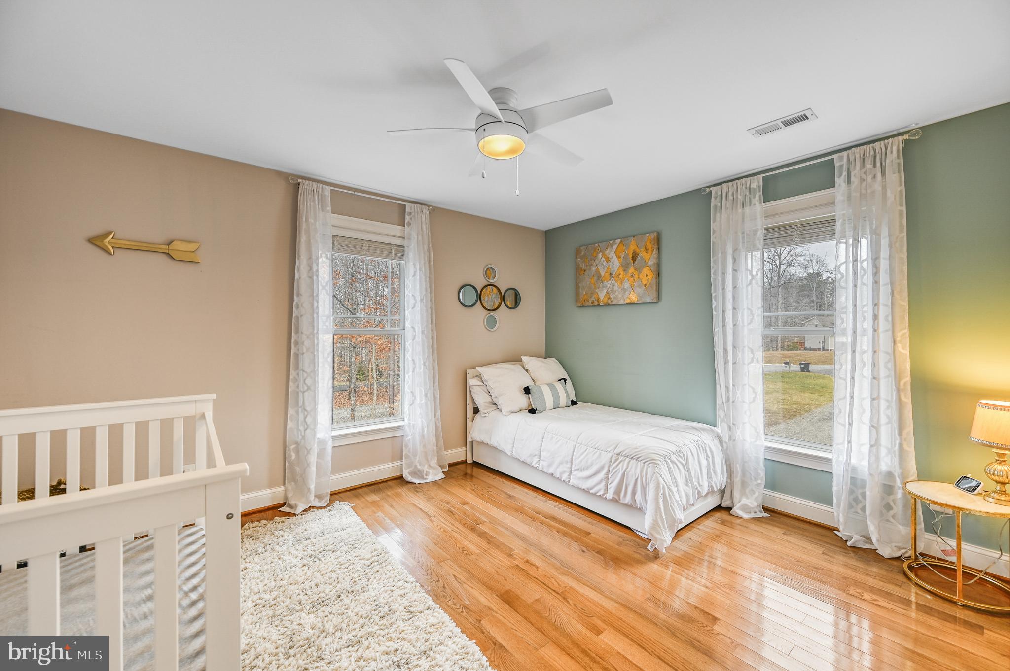 14 Elnor Road Bumpass, VA 23024 - Photo 42 of 69 a bedroom with a bed and a large window