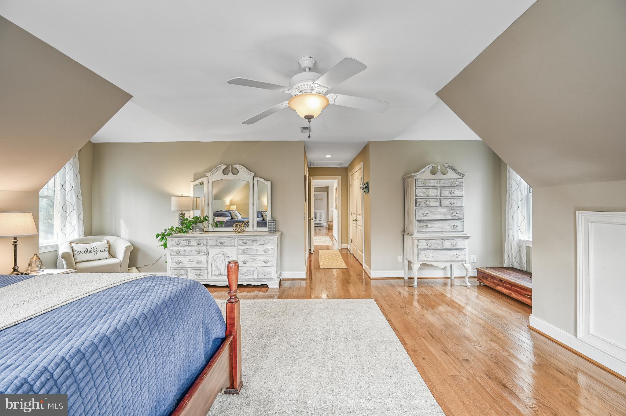 14 Elnor Road Bumpass, VA 23024 - Photo 49 of 69 a bedroom with a bed and a chandelier