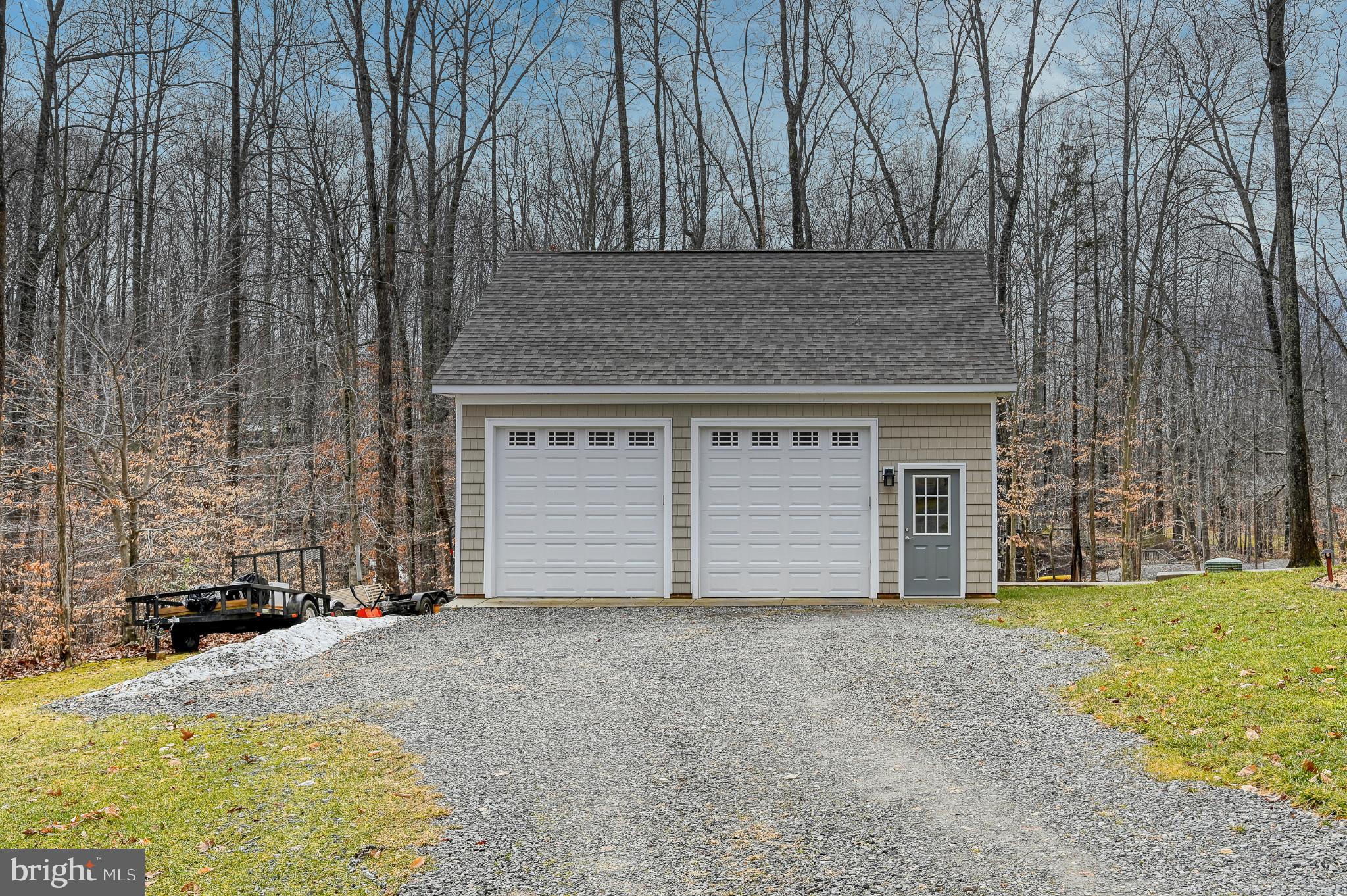 14 Elnor Road Bumpass, VA 23024 - Photo 54 of 69 Charming garage nestled in serene woods.