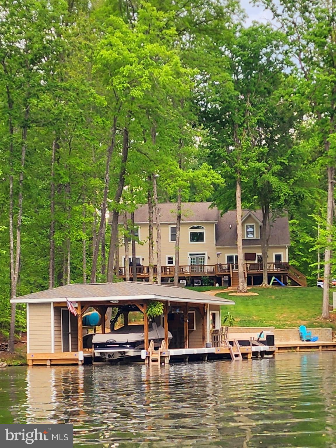 14 Elnor Road Bumpass, VA 23024 - Photo 57 of 69 a view of swimming pool with outdoor seating and trees