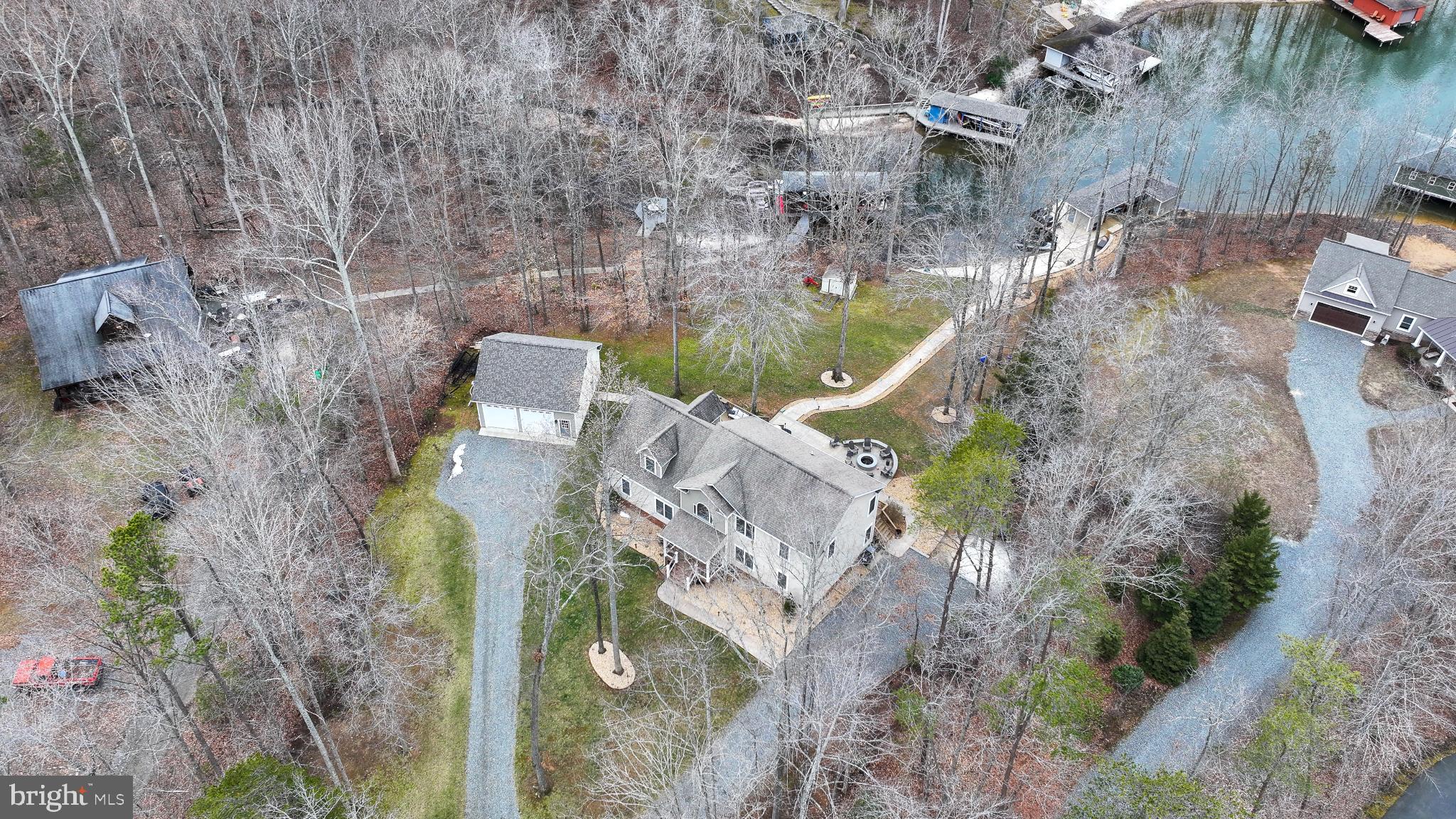 14 Elnor Road Bumpass, VA 23024 - Photo 61 of 69 Serene lakeside retreat surrounded by nature.