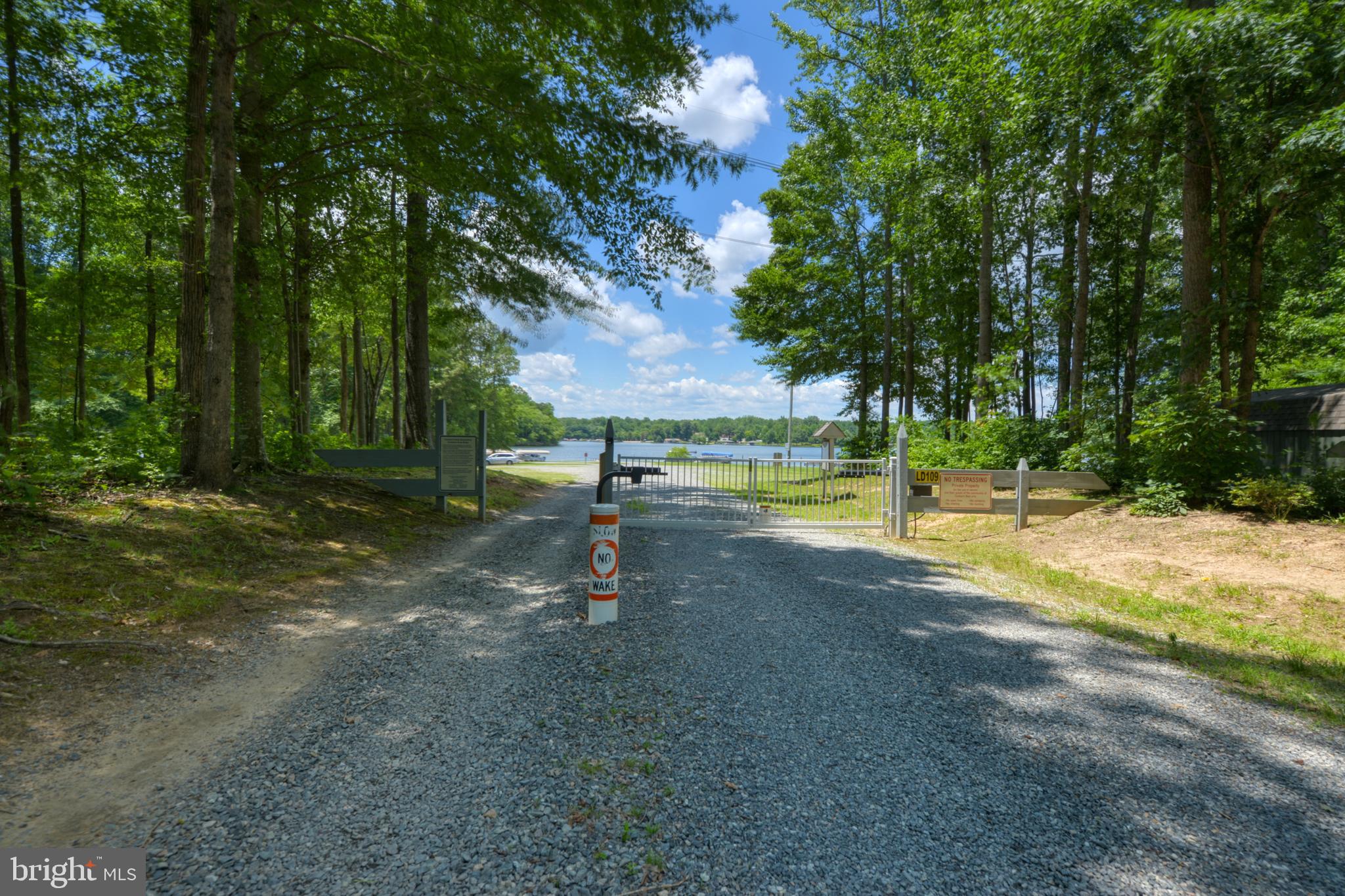 14 Elnor Road Bumpass, VA 23024 - Photo 64 of 69 a view of a park with swings and slides