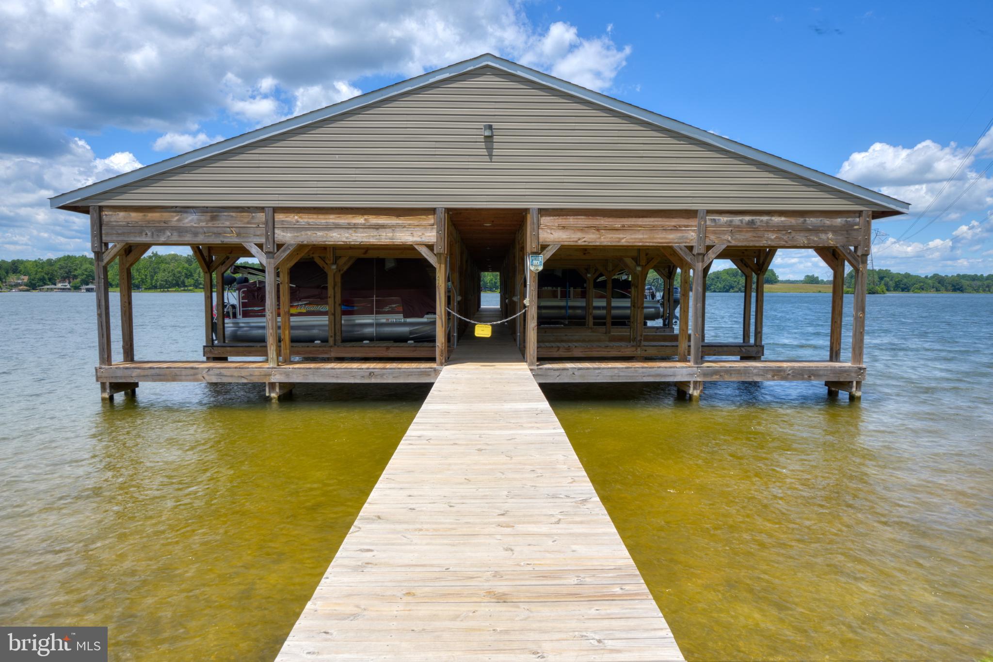 14 Elnor Road Bumpass, VA 23024 - Photo 69 of 69 a view of a swimming pool with seating space
