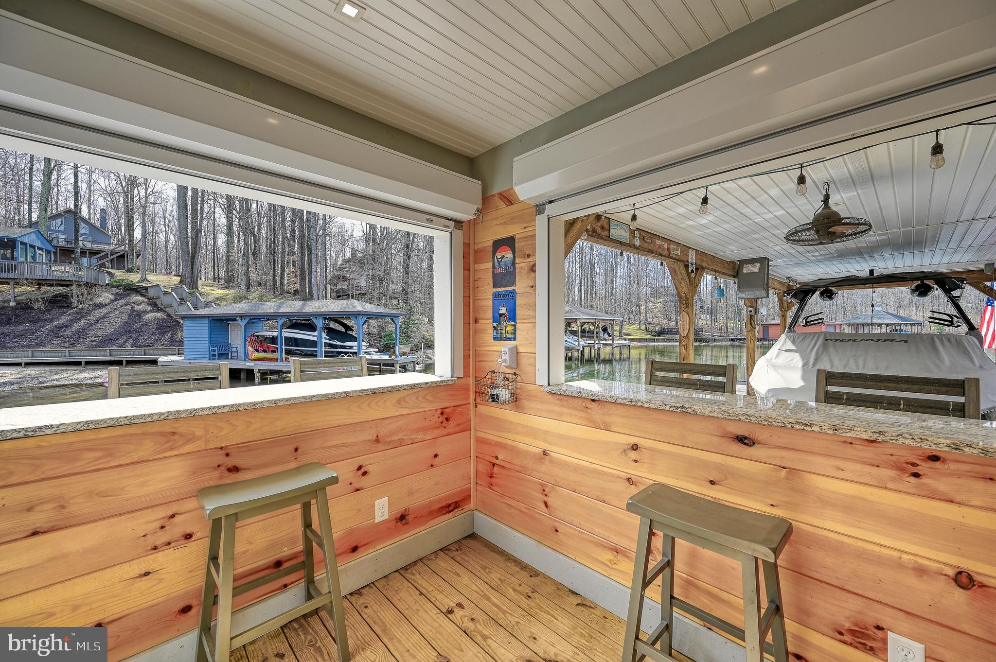 14 Elnor Road Bumpass, VA 23024 - Photo 7 of 69 a kitchen with stainless steel appliances kitchen island granite countertop a sink and cabinets