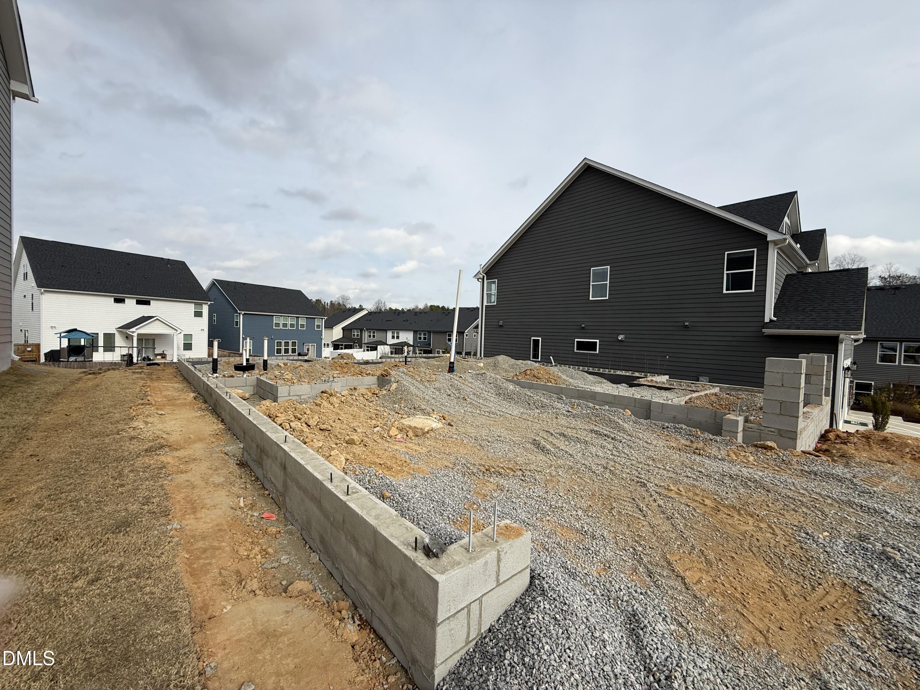 357 Murray Grey Lane Wake Forest, NC 27587 - Photo 3 of 13 a spacious bathroom with a tub and sink