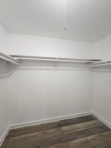 a view of a room with racks on the wall