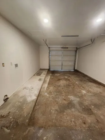 a view of a room with an empty space