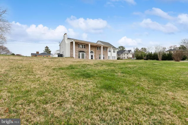 a big yard with large trees