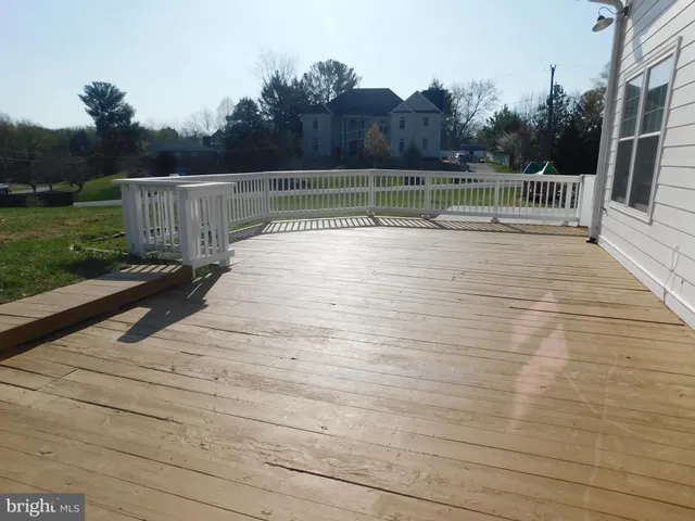 a view of outdoor space with garden and deck