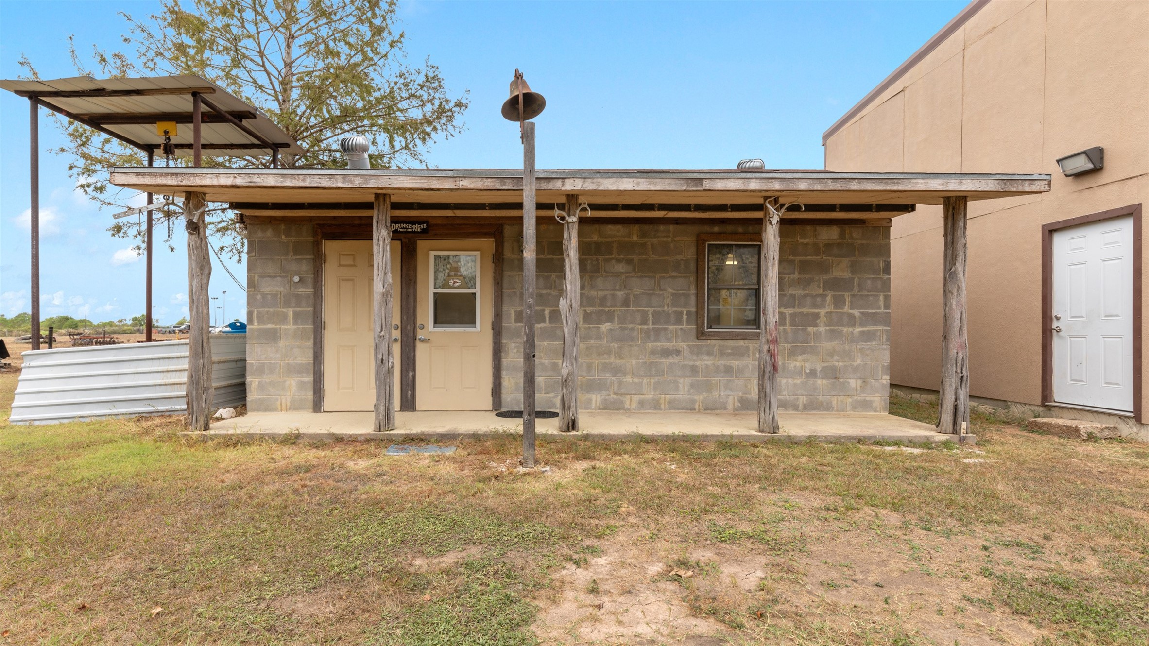19105 Mueschke Road Tomball, TX 77377 - Photo 37 of 42 Smokehouse/processing room provides additional functional space that may support storage, hobby use, or future operational needs.