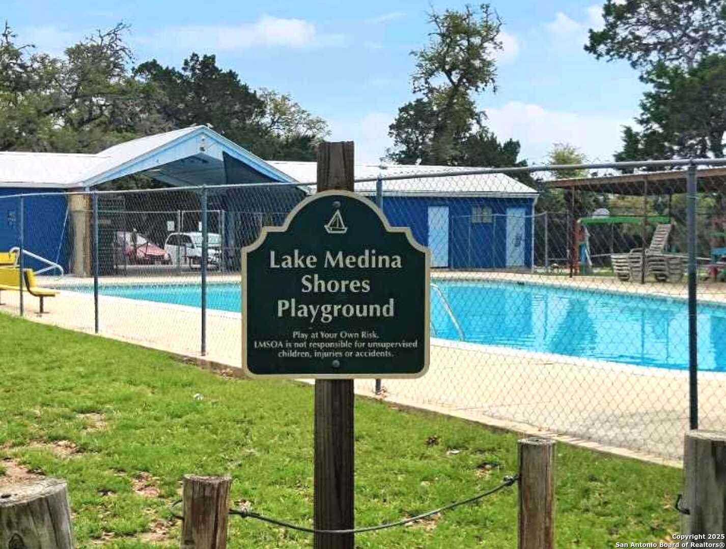 157 Hillside Road Bandera, TX 78003 - Photo 23 of 27 a sign on the side of a building